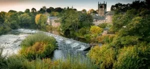 View of Bingley Church with River Aire
