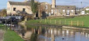 Reflection of Micklethwaite Bridge on Leeds and Liverpool Canal