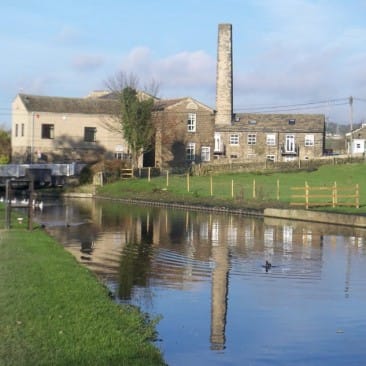 Reflection of Micklethwaite Bridge on Leeds and Liverpool Canal