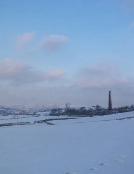 Rombalds Moors in Snow from Eldwick with Chimney in the Landscape