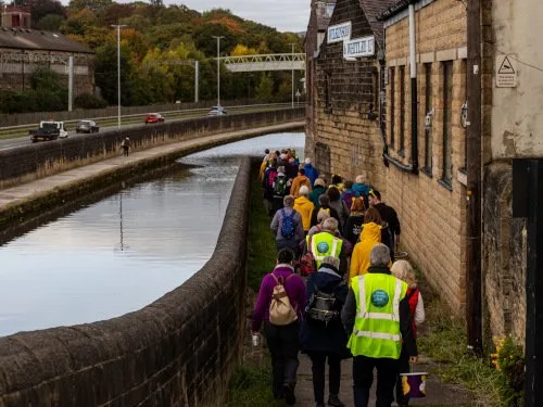 Group of people walking along canal for Community Countryfile Ramble - Photo by Marcus Rattray