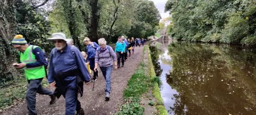 Group of people walking near Five Rise Locks for Community Countryfile Ramble