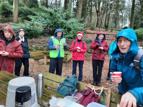 People sharing mulled wine