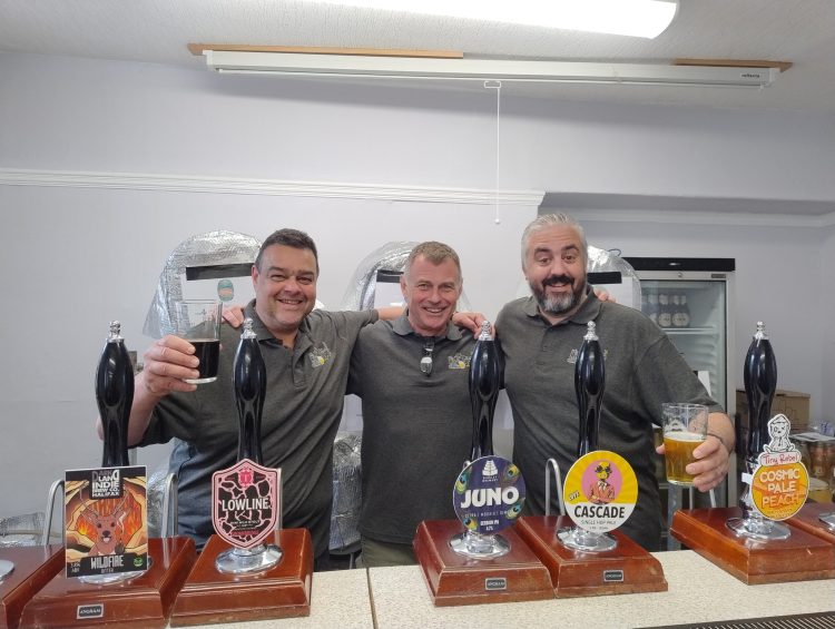 Behind the bar at Ale Saints Beer Festival in Bingley